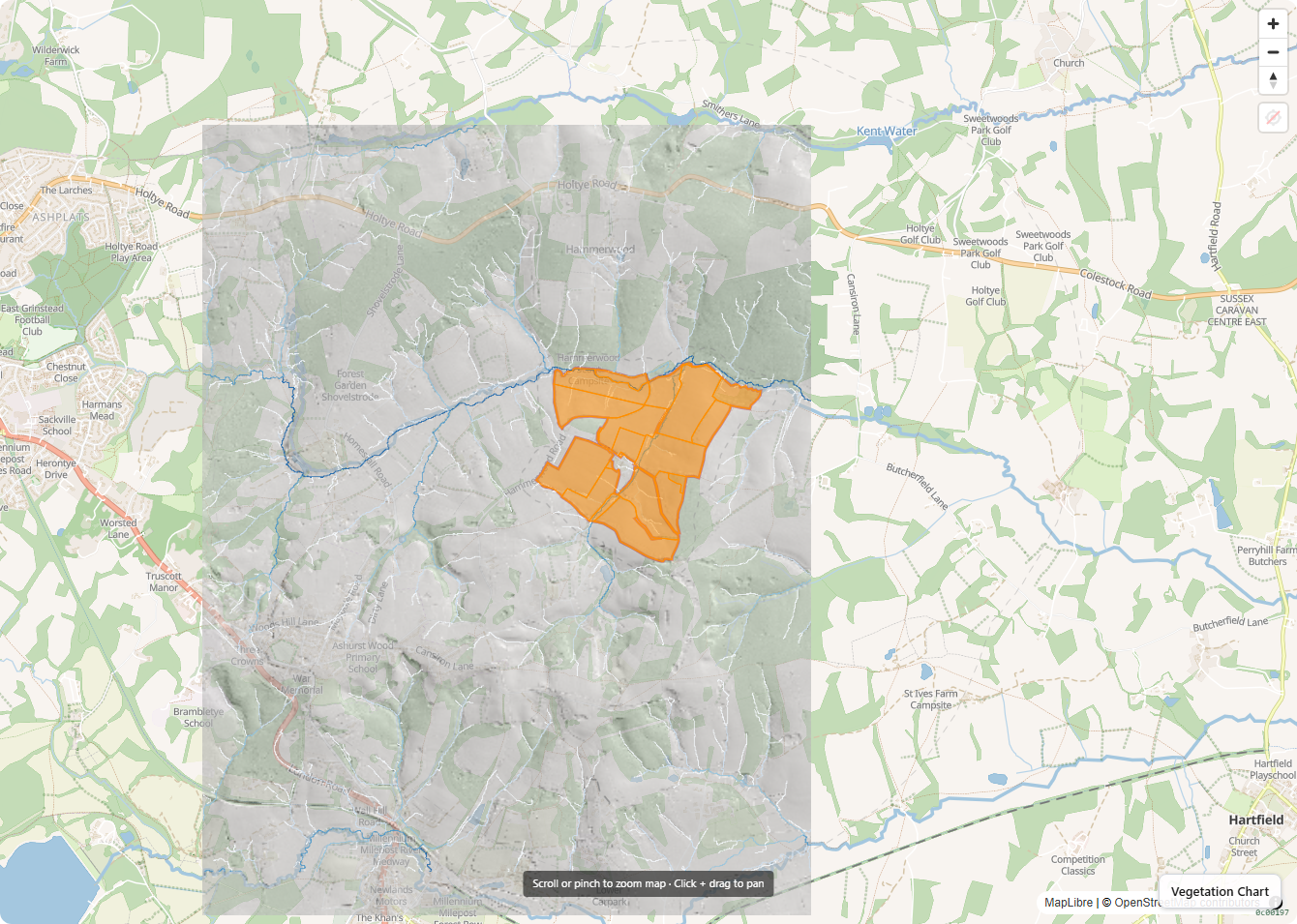 Farm boundary in orange over LiDAR hillshade, revealing the terrain inside the holding
